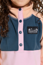 Didriksons Monte 3 Button Fleece. A girls mid-layer sweater in a pink and orange design and a button placket, elastic binding on the sleeve and a thermal, microfleece finish.