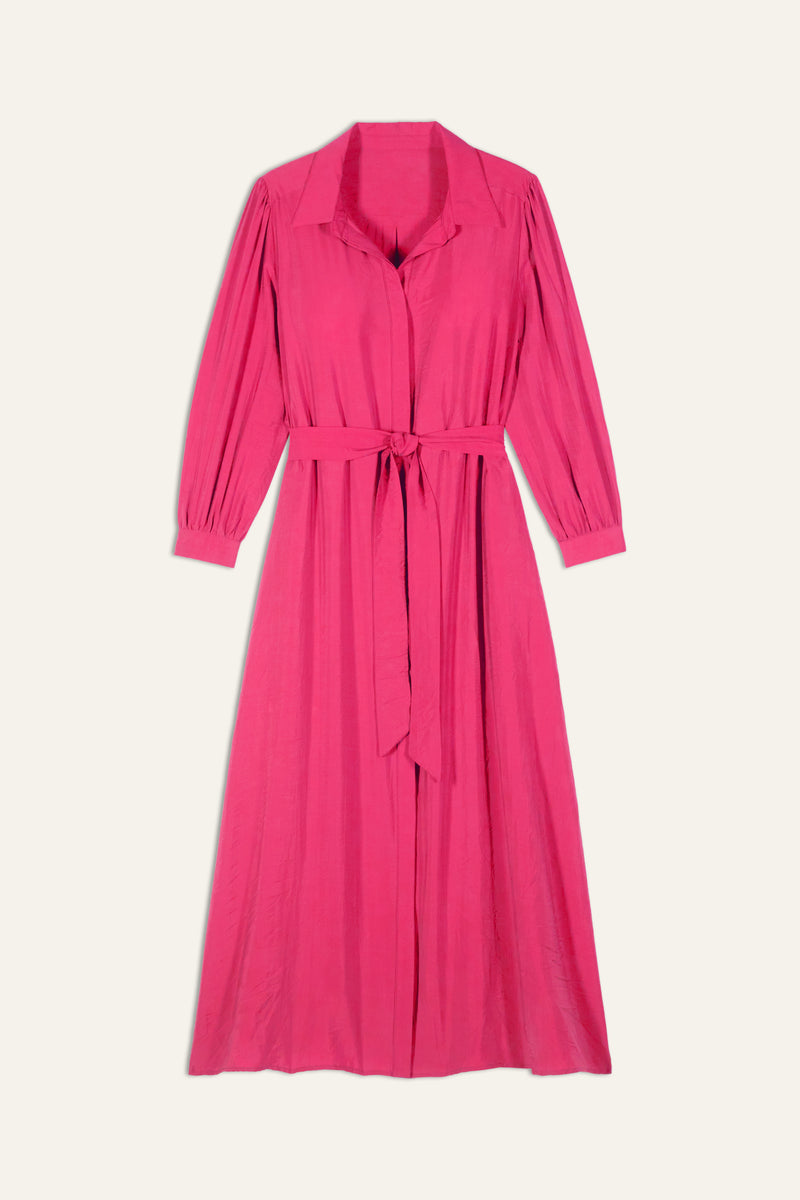 BA&SH Lara Shirt Dress. A midi length, long sleeve dress with shirt collar, tie waist, and buttons. Fuchsia.