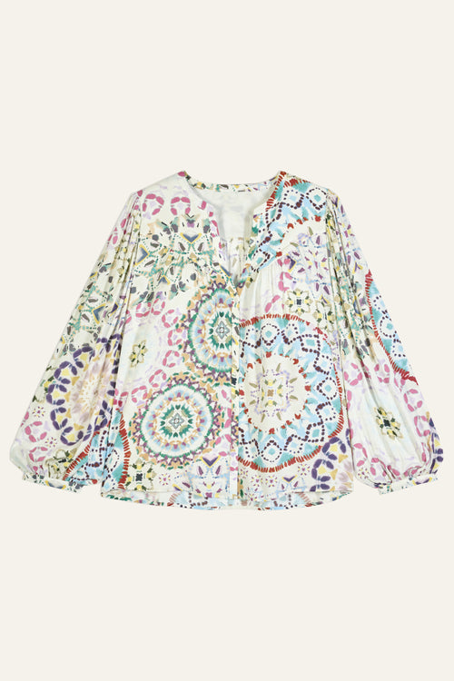 BA&SH Luigi Blouse. A long sleeve boho style blouse with V-neckline. This top is boasts a colourful print.