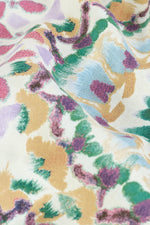 BA&SH Luigi Blouse. A long sleeve boho style blouse with V-neckline. This top is boasts a colourful print.