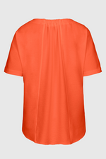 An image of the Bianca Sahra Blouse in the colour Orange.