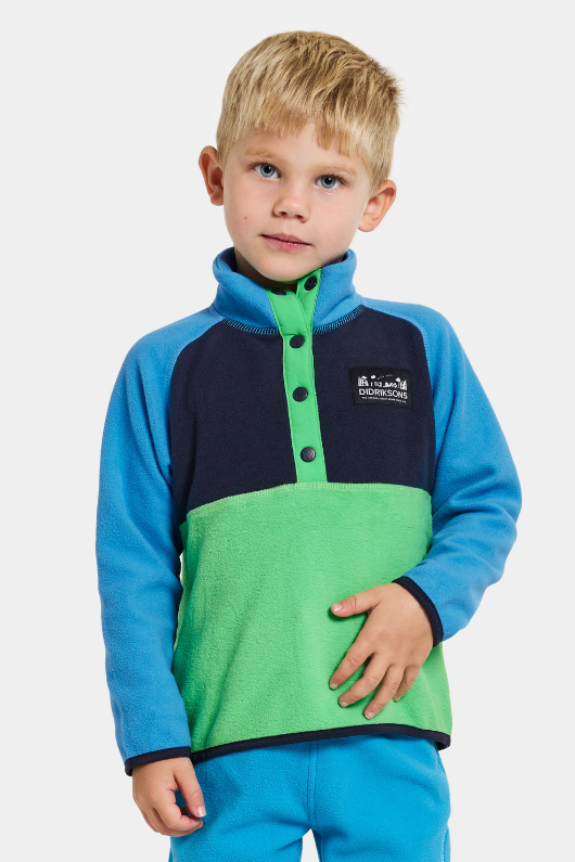 Didriksons Monte 3 Button Fleece. A boys mid-layer sweater in a green & blue design and a button placket, elastic binding on the sleeve and a thermal, microfleece finish.