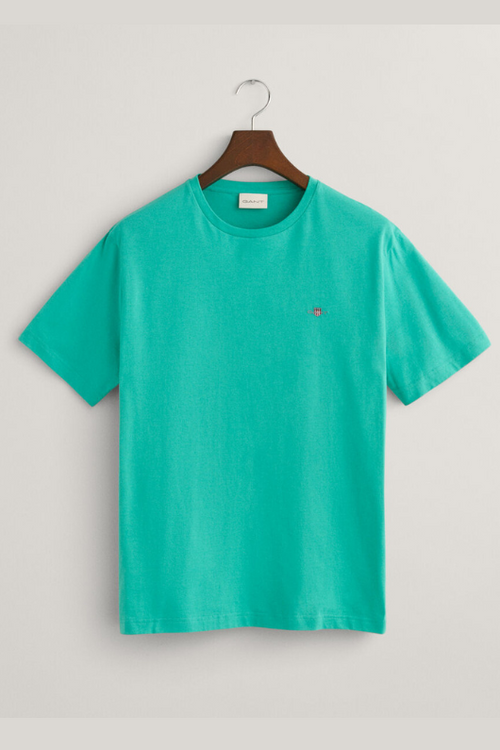 An image of the Gant Shield T-Shirt in the colour Lagoon Blue.