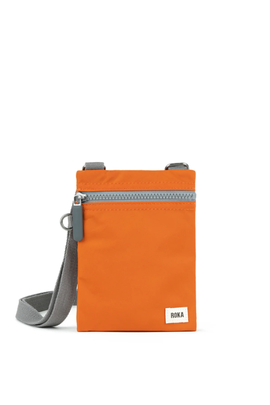 An image of the Roka London Chelsea Burnt Orange Recycled Nylon Crossbody Bag.