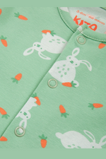 Kite Sleepsuit. A green sleepsuit featuring a bunny print, with poppers on the legs and scratch mitts up to 6 months.