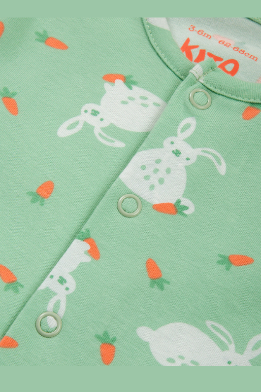 Kite Sleepsuit. A green sleepsuit featuring a bunny print, with poppers on the legs and scratch mitts up to 6 months.