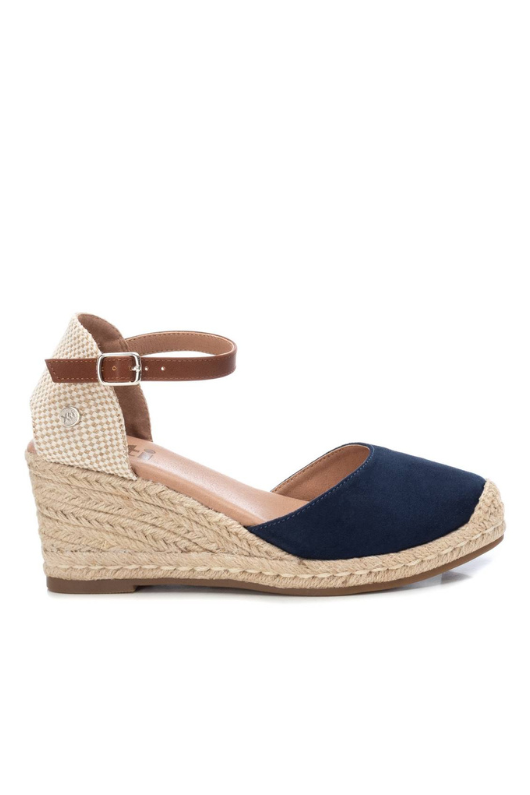 Xti Wedge Sandal. Women's espadrille wedge sandals with a navy, microfibre faux suede upper, a faux leather strap, a 7cm jute wedge and a non-slip rubber sole.