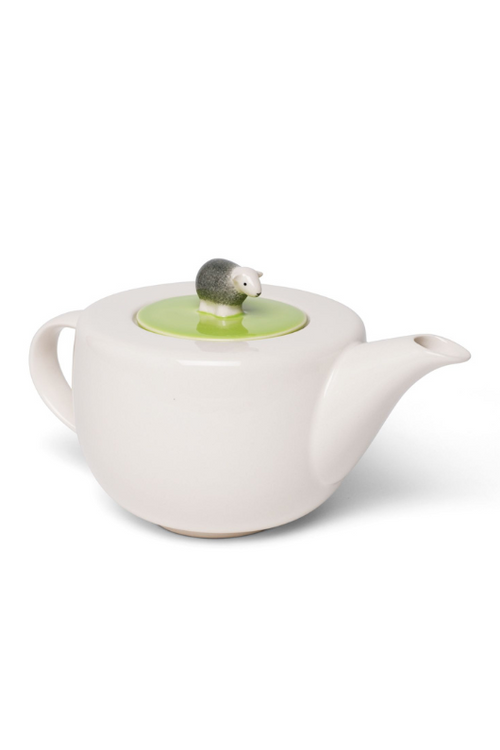 The Herdy Company Teapot in white with a small sheep on the top.