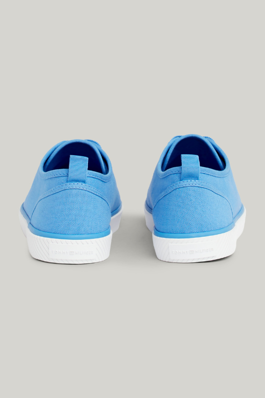 An image of the Tommy Hilfiger Enamel Flag Canvas Trainers