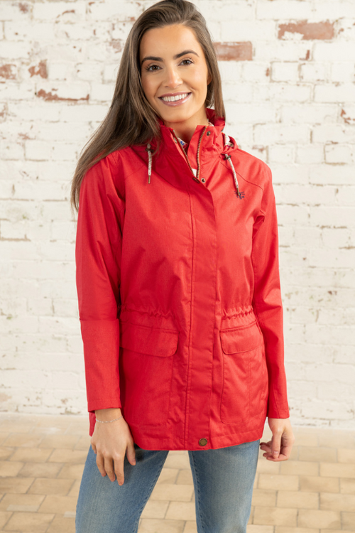 Lighthouse Willow Coat. A windproof & waterproof women's jacket with an adjustable drawstring waist, pockets, two-way front zip, and a chic red design