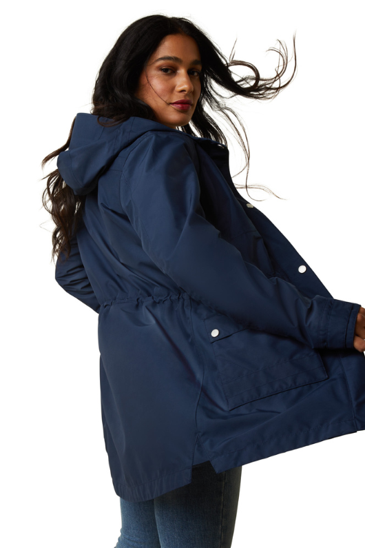 An image of a female model wearing the Ariat Atherton H20 Jacket in the colour Navy.