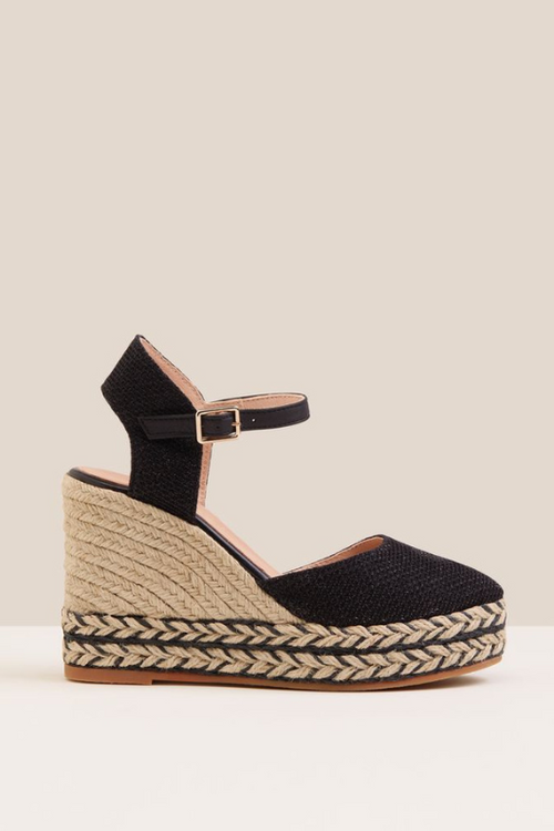 An image of the Gaimo Tiri Wedge High Sandals in the colour Black.