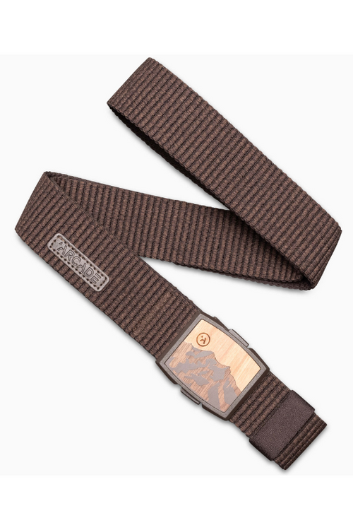 Arcade Belts Woody Slim Belt. A slim stretch belt with adjustable buckle featuring a mountain design on the buckle. This belt is in the style Heather Walnut.