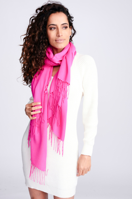 Pia Rossini Pashmina. A fuchsia pashmina with fringe detailed edges.