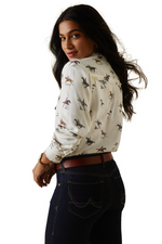 An image of a female model wearing the Ariat Clarion Blouse in the colour Fresh Print.