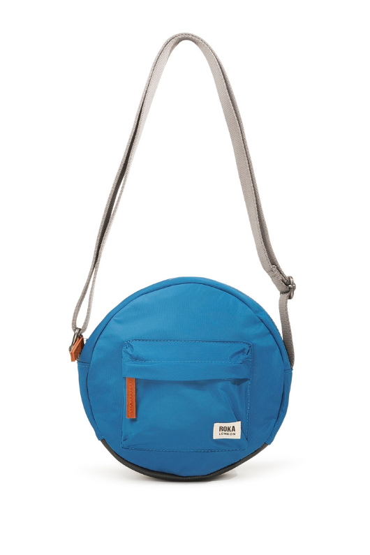 An image of the Roka London Paddington B Crossbody Bag in the colour Seaport.