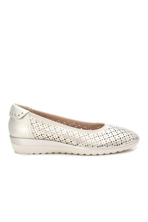 Xti Wedge Shoe. A women's ballerina shoe with a non-slip rubber sole, a slight wedged heel and a pretty, silver die-cut design.