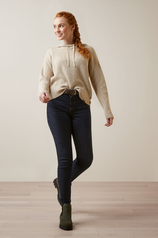 An image of a female model wearing the Ariat Los Altos Sweater in the colour Oatmeal Heather.