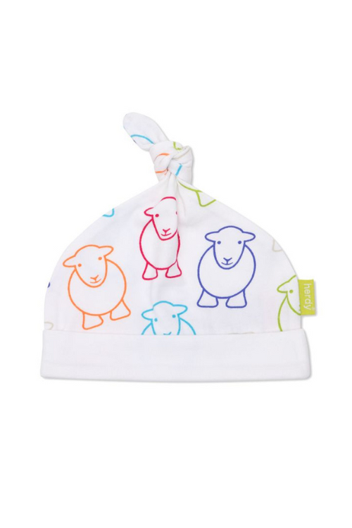 The Herdy Company Baby Marra Beanie in white with a colourful sheep outline design all-over
