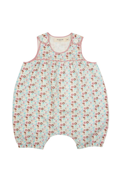 Pigeon Organics Baby Playsuit. This playsuit is sleeveless with buttons on the shoulders, convenient poppers, and a cute pink floral pattern.
