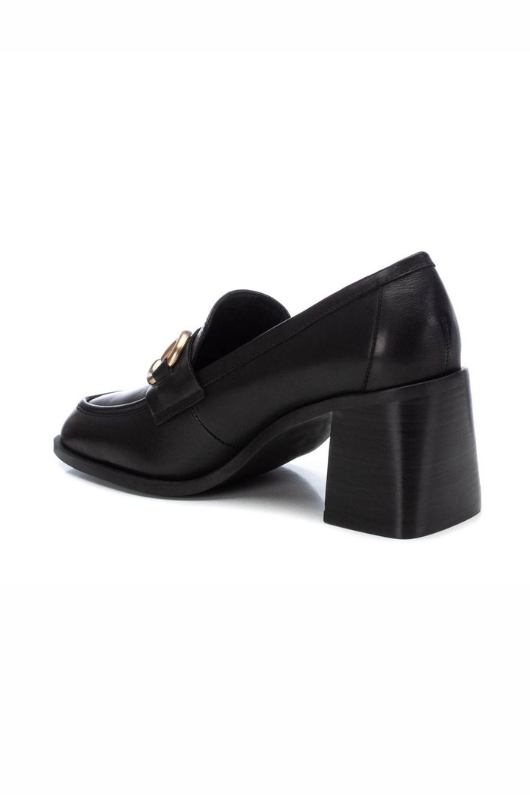 Carmela Heeled Leather Loafer. A pair of 7cm heeled black loafers with buckle detail.