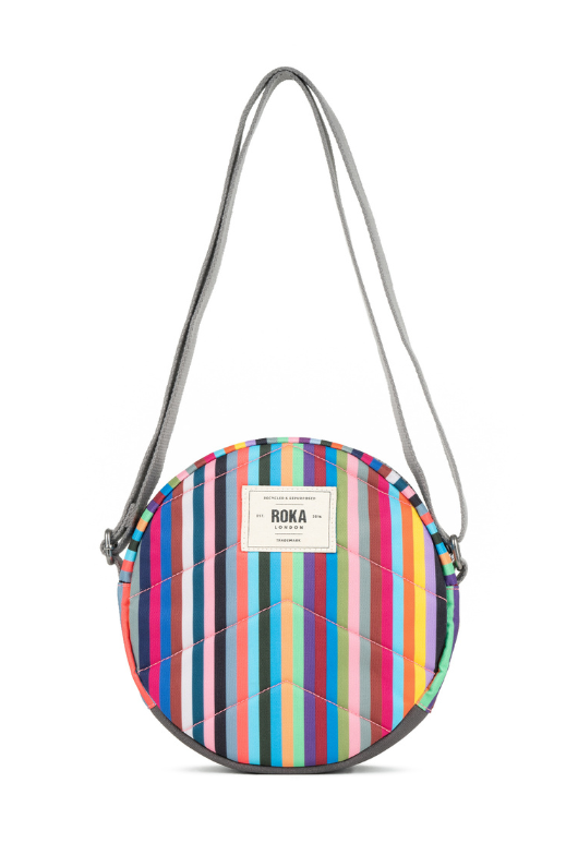 An image of the Roka London Paddington Multi Stripe Recycled Canvas Crossbody Shoulder Bag.