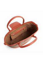 Fairfax & Favor Windsor Leather Basket Bag. A basket bag with Melon coloured details, tassel, crossbody strap, and studded base.