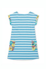 Kite Dress. A short sleeve, round neck dress with blue and white striped print and multicoloured contrasting pockets and hems.