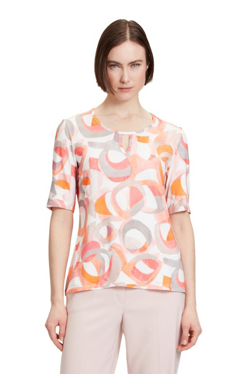 An image of a female model wearing the Betty Barclay Half Sleeve Top in the colour Rose Cream.