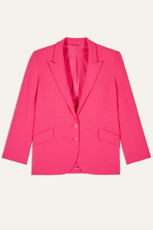 An image of a female model wearing the BA&SH Cher Oversized Blazer Jacket in the colour Pink.