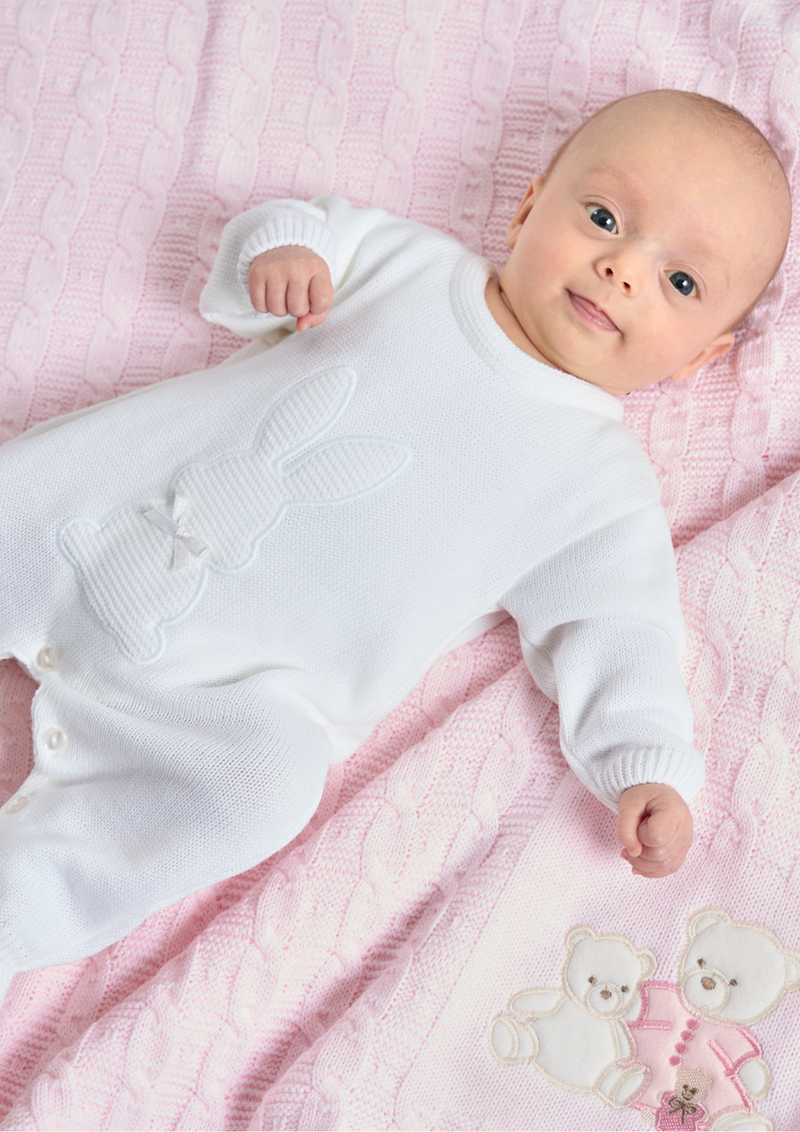 An image of the Dandelion Clothing Knitted Bunny Onesie With Satin Neck Bow