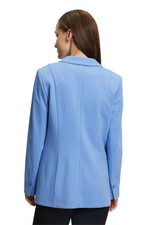 An image of the Betty Barclay Blazer, with lapel collar, patch pockets, padded shoulders, and button fastenings. The colour of this blazer is aqua blue.