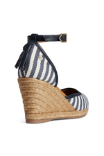 Fairfax & Favor Monaco Wedge Sandal. A pair of Navy striped sandals with tonal embroidered toe, tassel detail, wedge heel, and espadrille style sole.