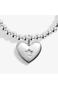 An image of the Joma Jewellery Christmas A Little Peace, Love and Joy Bracelet