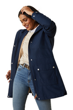 An image of a female model wearing the Ariat Atherton H20 Jacket in the colour Navy.