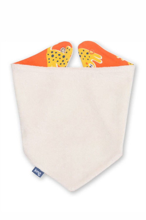 Kite Bib. A reversible bib with adjustable popper fastenings. The front has an orange leopard pattern and the reverse has cream towelling material.