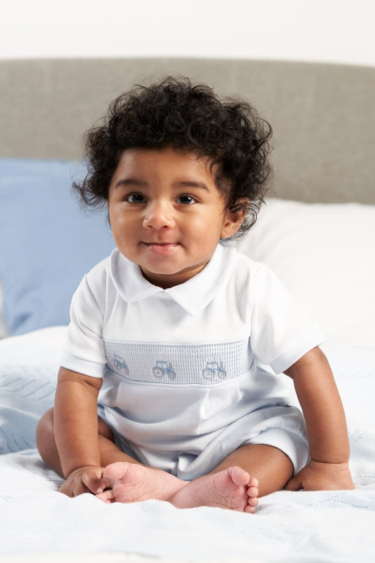 An image of the Dandelion Little Tractor Smocked Romper