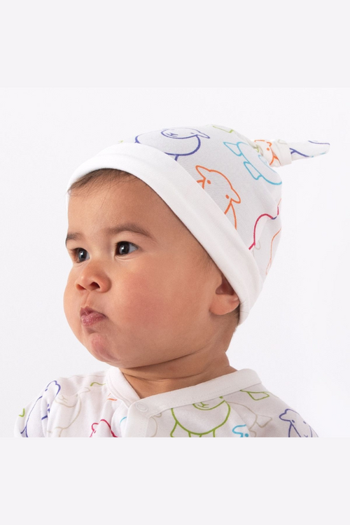 The Herdy Company Baby Marra Beanie in white with a colourful sheep outline design all-over