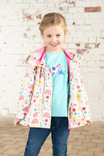 Lighthouse Heidi Jacket. A kids, waterproof coat with a soft jersey lining, and a sweet rainbows & sunshine design on a white background.