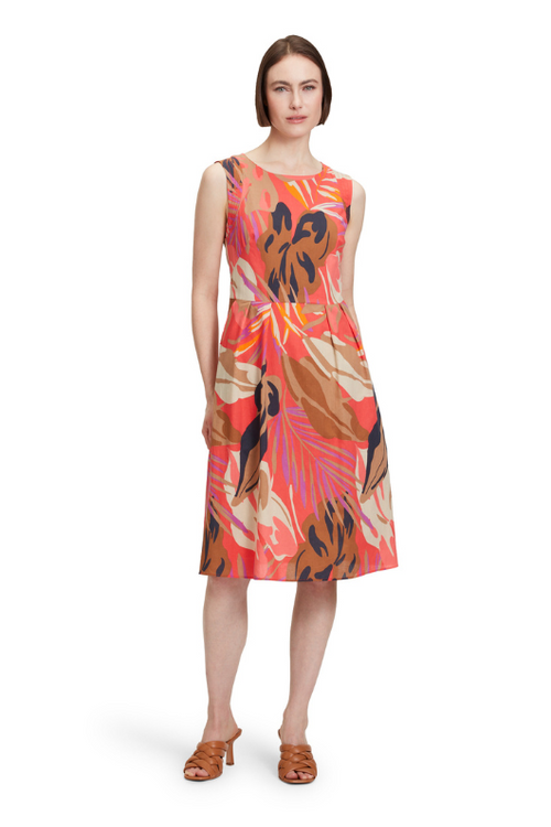 An image of a model wearing the Betty Barclay Leaf Pattern Dress in the colour Red/Beige.