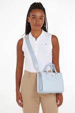 An image of the Tommy Hilfiger Monotype Webbing Strap Small Tote in the colour Breezy Blue.