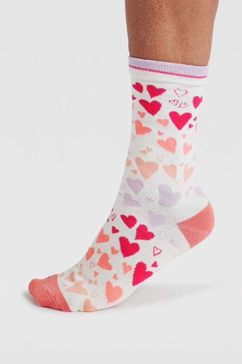 An image of the Thought Socks Eva Heart Scatter Bamboo Socks in the colour Earthy Pink.
