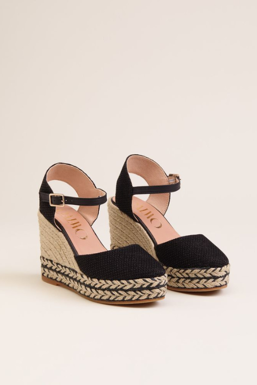 An image of the Gaimo Tiri Wedge High Sandals in the colour Black.