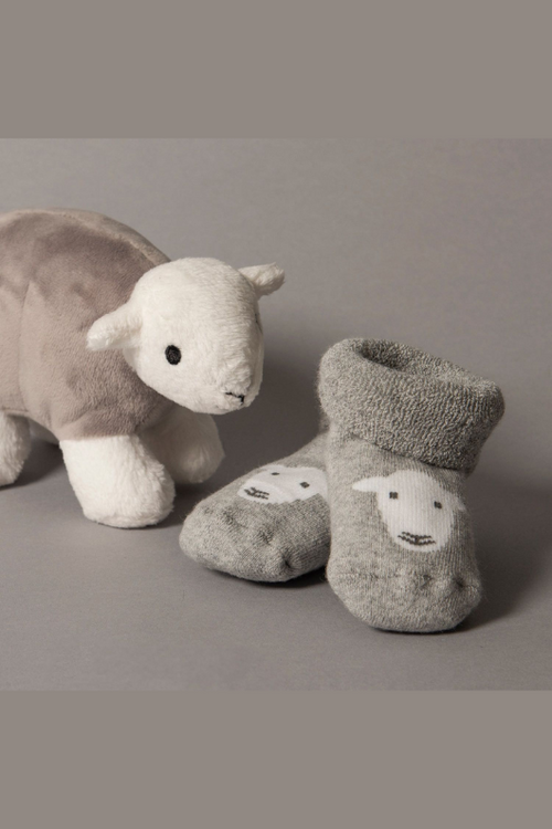 The Herdy Company Baby Socks in grey with a white sheep head design.