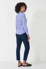 An image of a female model wearing the Crew Clothing Lulworth Shirt in the colour Blue Floral Print.