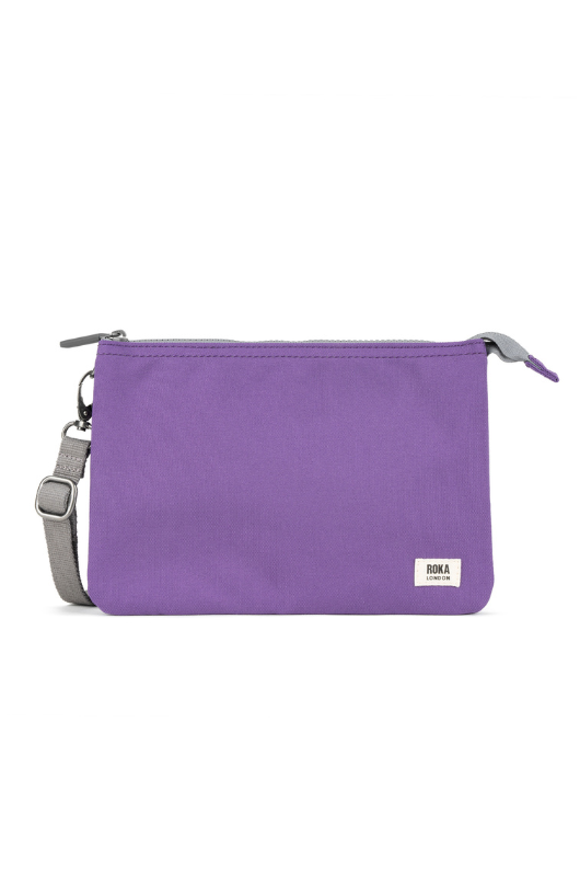 An image of the Roka London Carnaby Crossbody XL Imperial Purple Recycled Canvas Bag.