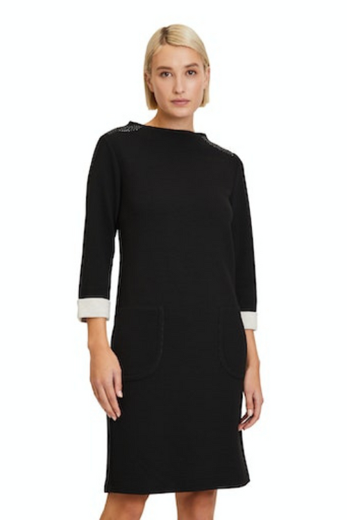 An image of a female model wearing the Betty Barclay 3/4 Sleeve Dress in the colour Black & Cream.