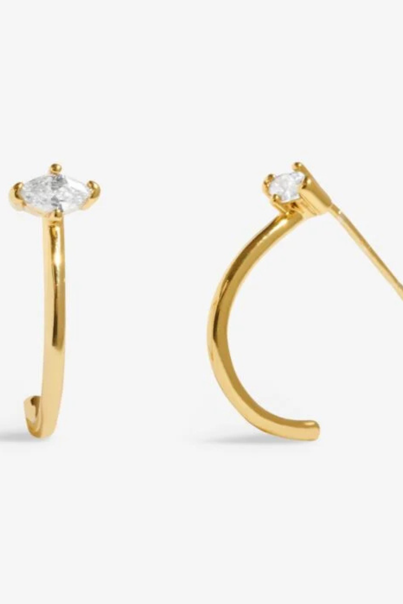 An image of the Joma Jewellery Style Stories Eye Hoop Earrings