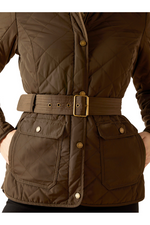 An image of a female model wearing the Ariat Woodside Jacket in the colour Earth.