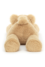 Jellycat Smudge Bear. A teddy bear with honey-coloured fur, in a cuddly pose.